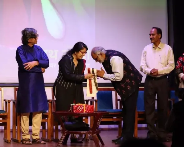 A memento presentation moment on the festival stage